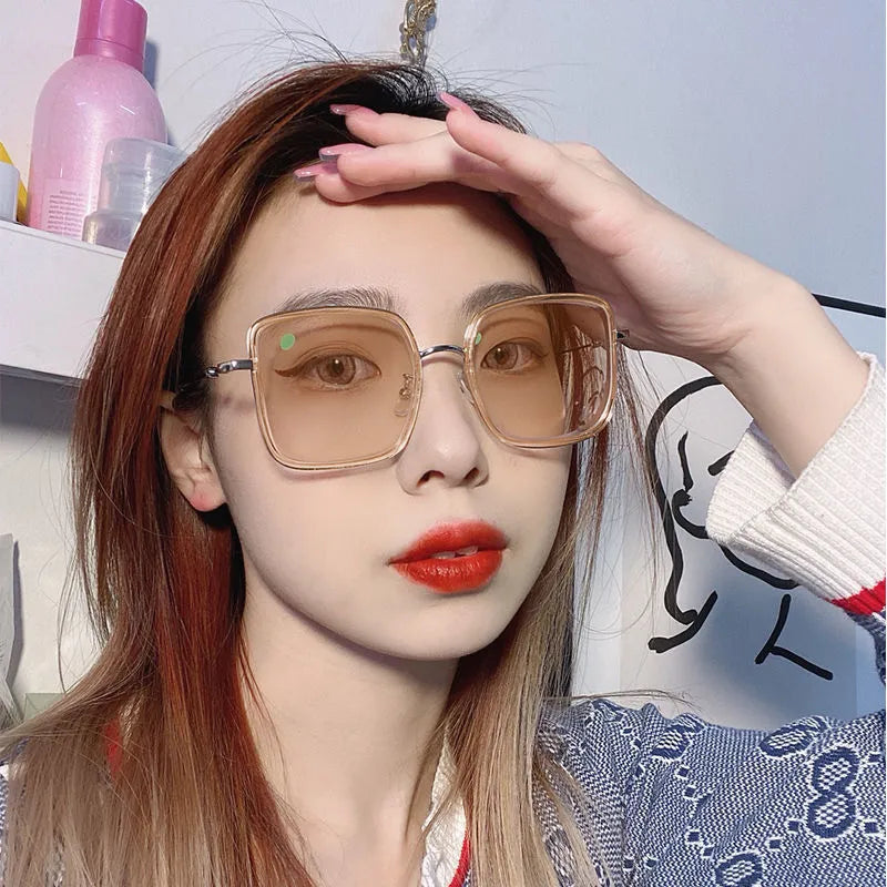 Photochromic myopia glasses with large frame, anti-blue light lens, available in four black gold frame colours