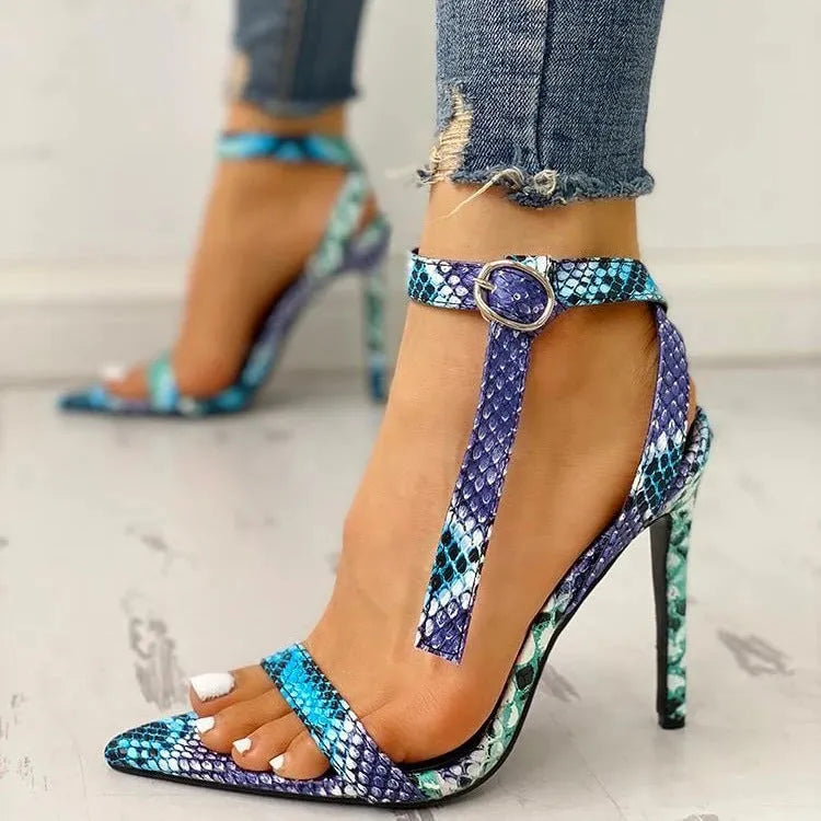 Blue women's high heel sandals with cut-out details and a buckle strap, shown in a large size.