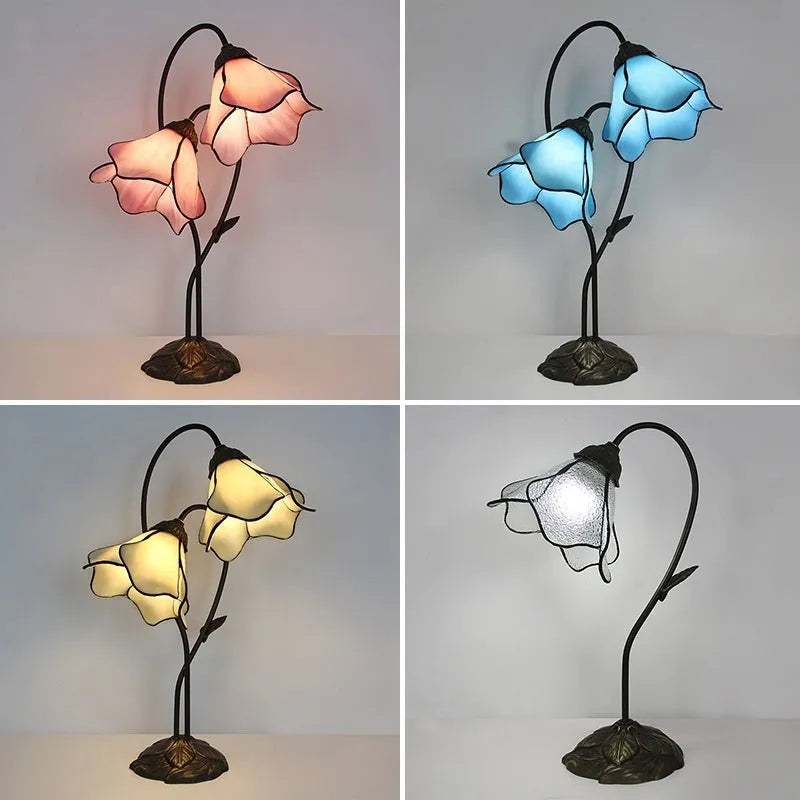 Retro American classical desk lamp with a decorative glass shade on a table.