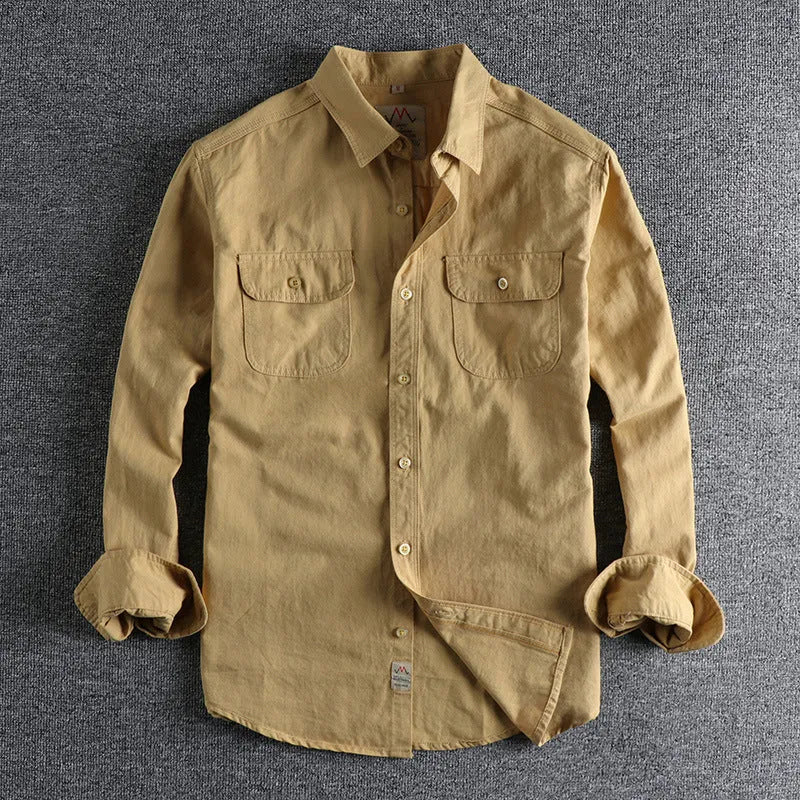 Men's solid colour cotton long sleeve shirt in cardigan style shown in light blue and white options