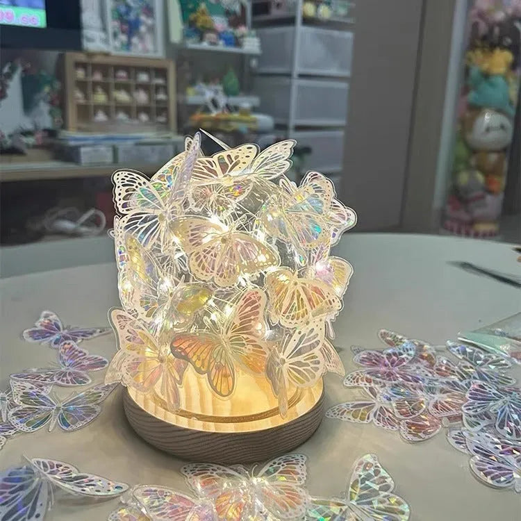 Butterfly night lamp with glass shade and natural wood base measuring 12x15cm
