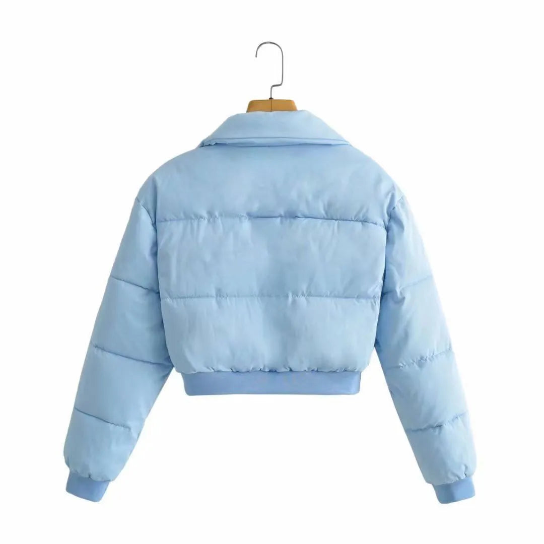 A woman's loose-fitting long sleeve polyester jacket in a choice of colours.