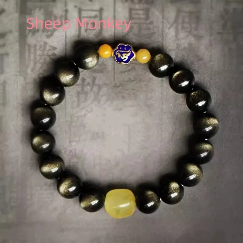 Golden obsidian ethnic bracelet with geometric shape and Chinese zodiac animal charm