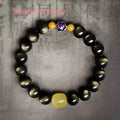 Golden obsidian ethnic bracelet with geometric shape and Chinese zodiac animal charm