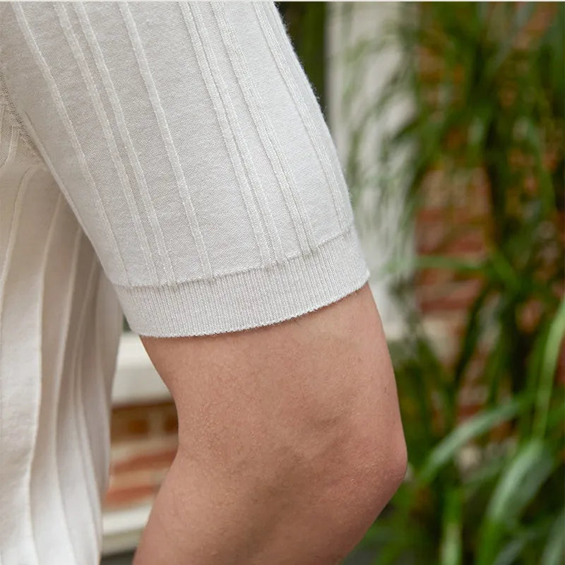 Short sleeve slim fit sunken stripe knitwear top in 100% lyocell, available in black and white, sizes M to 3XL