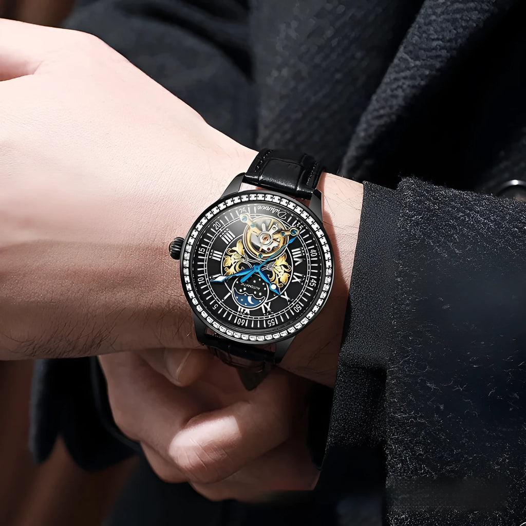 Men's stainless steel mechanical watch with a round dial, mineral glass, and a butterfly clasp, shown on wrist.