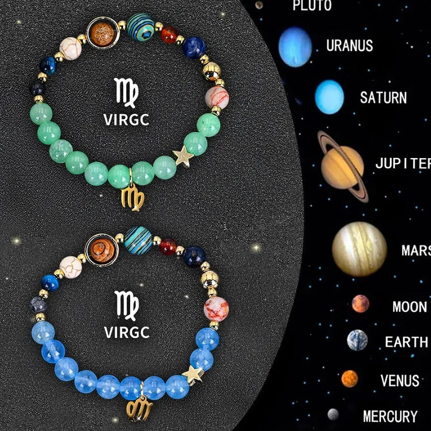 Two natural stone beaded bracelets with zodiac charms on a wooden surface.