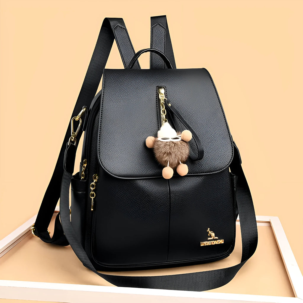 Genuine leather travel backpack with pendant in beige colour for female students, featuring belt decoration and splicing details