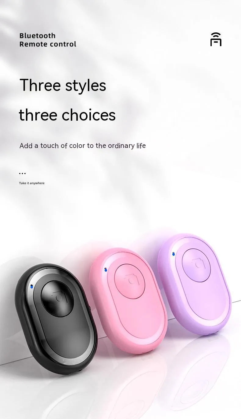 Wireless Bluetooth remote control for smartphone photography in black, pink, and purple colour options