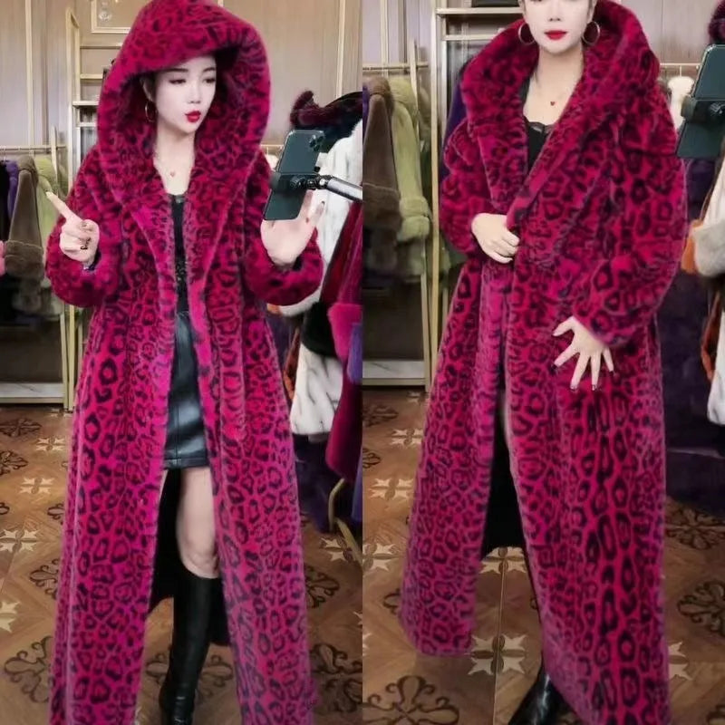 Long brown leopard print faux fur coat on a model, showing its loose plus-size fit and 100cm length.