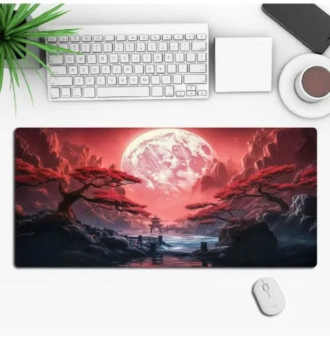 Large black anime-themed gaming mouse pad with non-slip rubber base on a wooden desk.