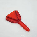 Red adjustable telescopic can and bottle opener made from ABS plastic on a white background.
