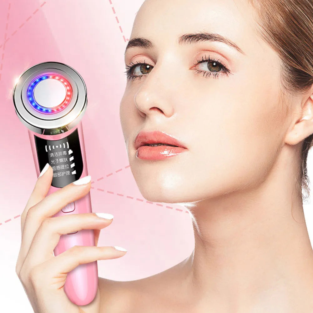 Warm skin rejuvenation facial vibration massager with IPL function, BY-009 model, on a surface