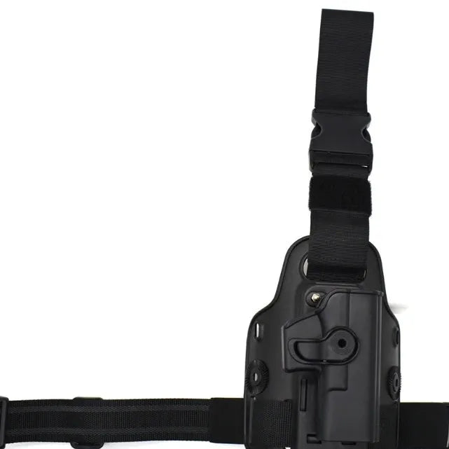 Tactical leg holster with waist plate and quick-pull plastic construction in outdoor setting
