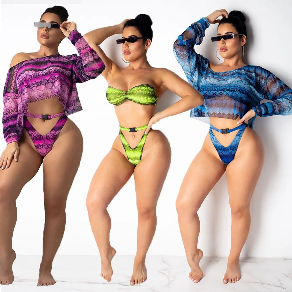 Women's purple snakeskin floral print long-sleeve swimsuit top and matching bikini bottoms.