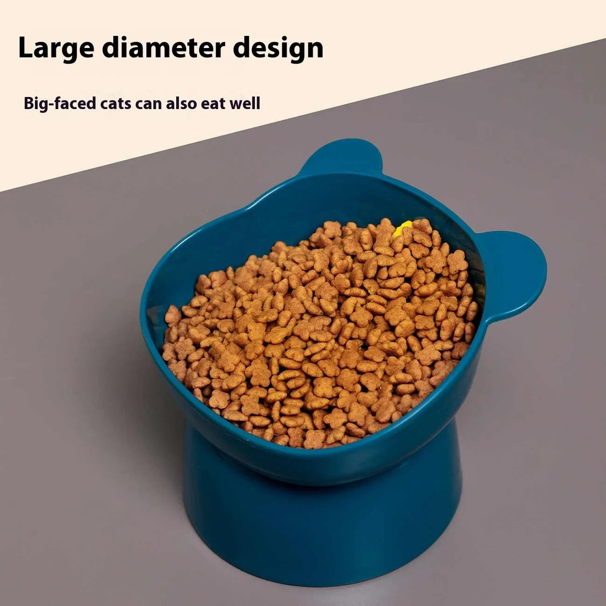 Oblique high foot pet bowl in PP for cats and dogs, shown in one of four colours: rouge pink, deep sea blue, lemon yellow or green grass green.