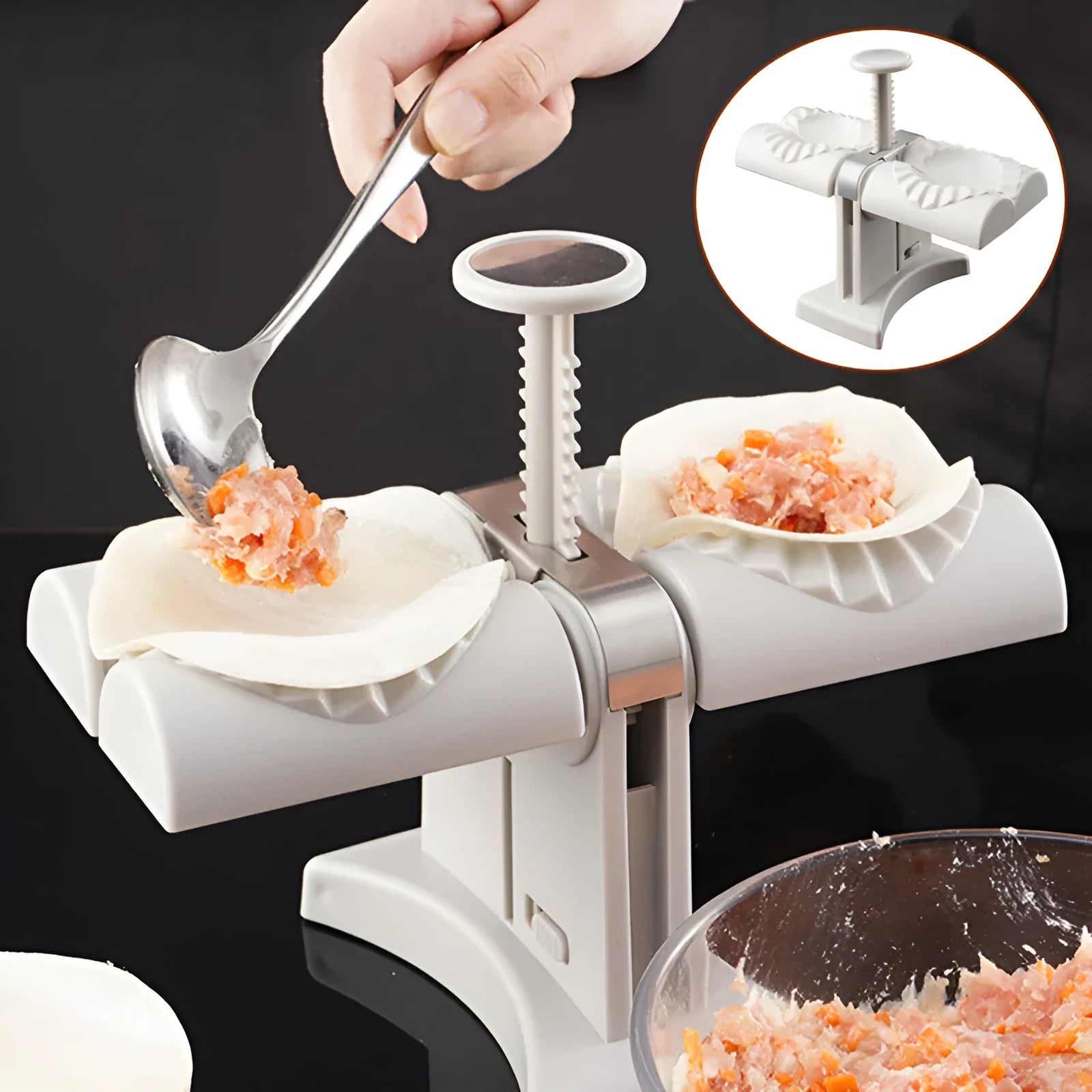 White double-head manual dumpling maker with anti-slip rubber base on a kitchen counter.