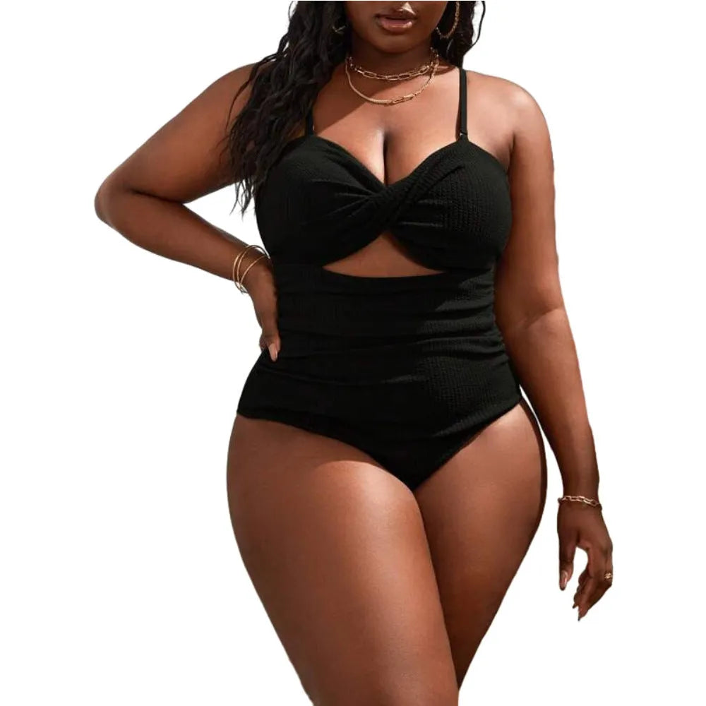 Black plus size women's slimming one-piece swimsuit with sleeveless triangle style design