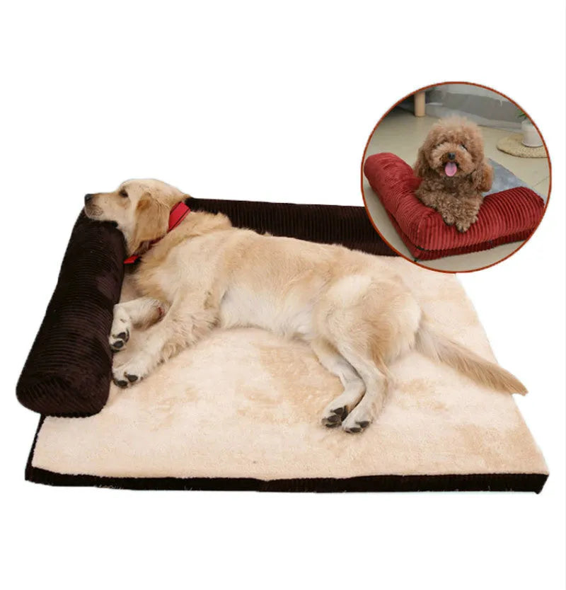 Large grey corduroy dog sofa bed with raised sides on a wooden floor