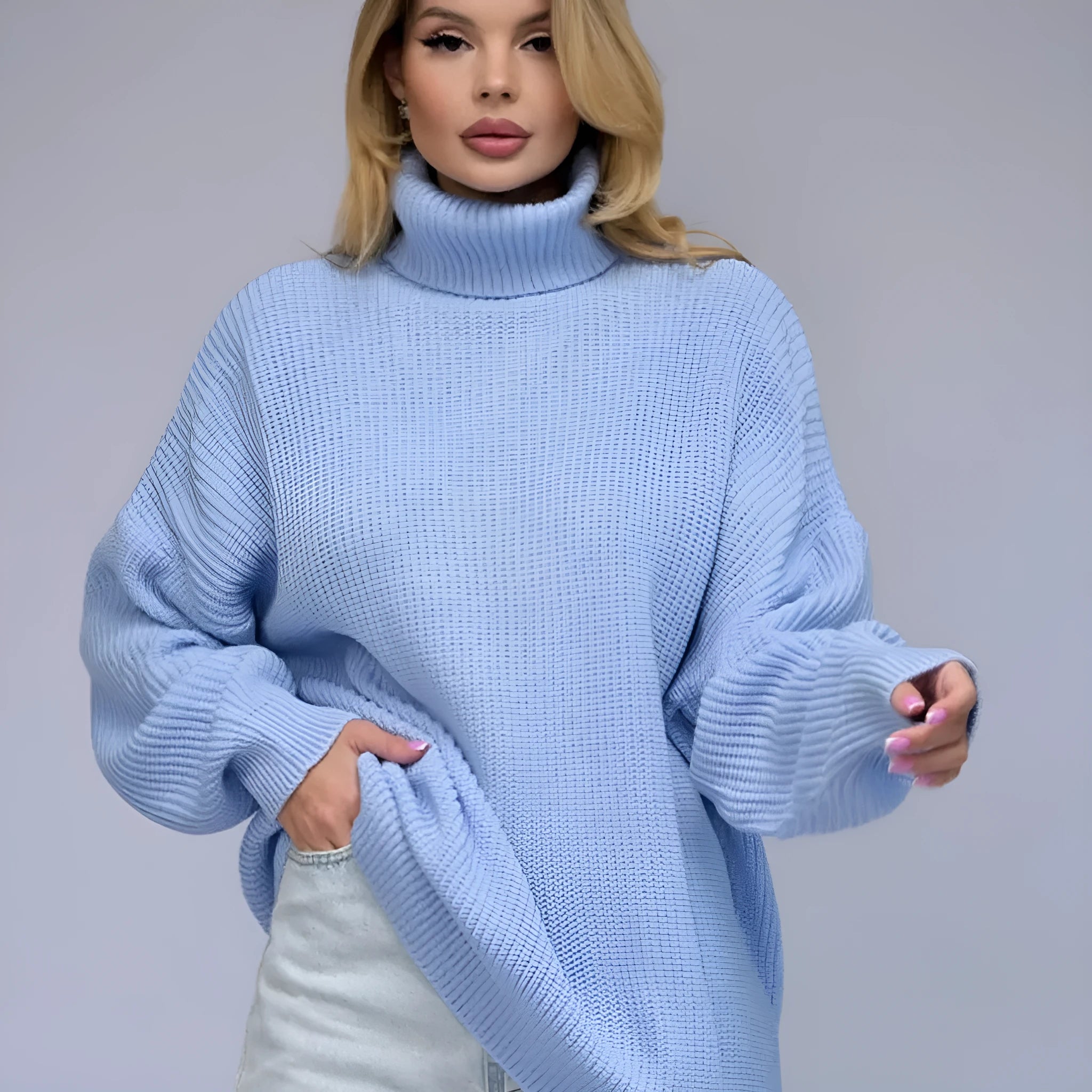 Women's high neck pullover sweater in thick imitation cashmere fabric, shown in sky blue colour.