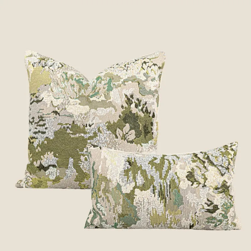 Antique green wool blend cushion with abstract spring flowers pattern in square and rectangular sizes.