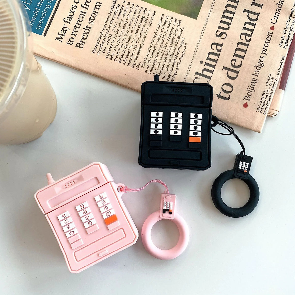Silicone AirPods case for 1st and 2nd generation in pink or black with anti-knock cartoon cover