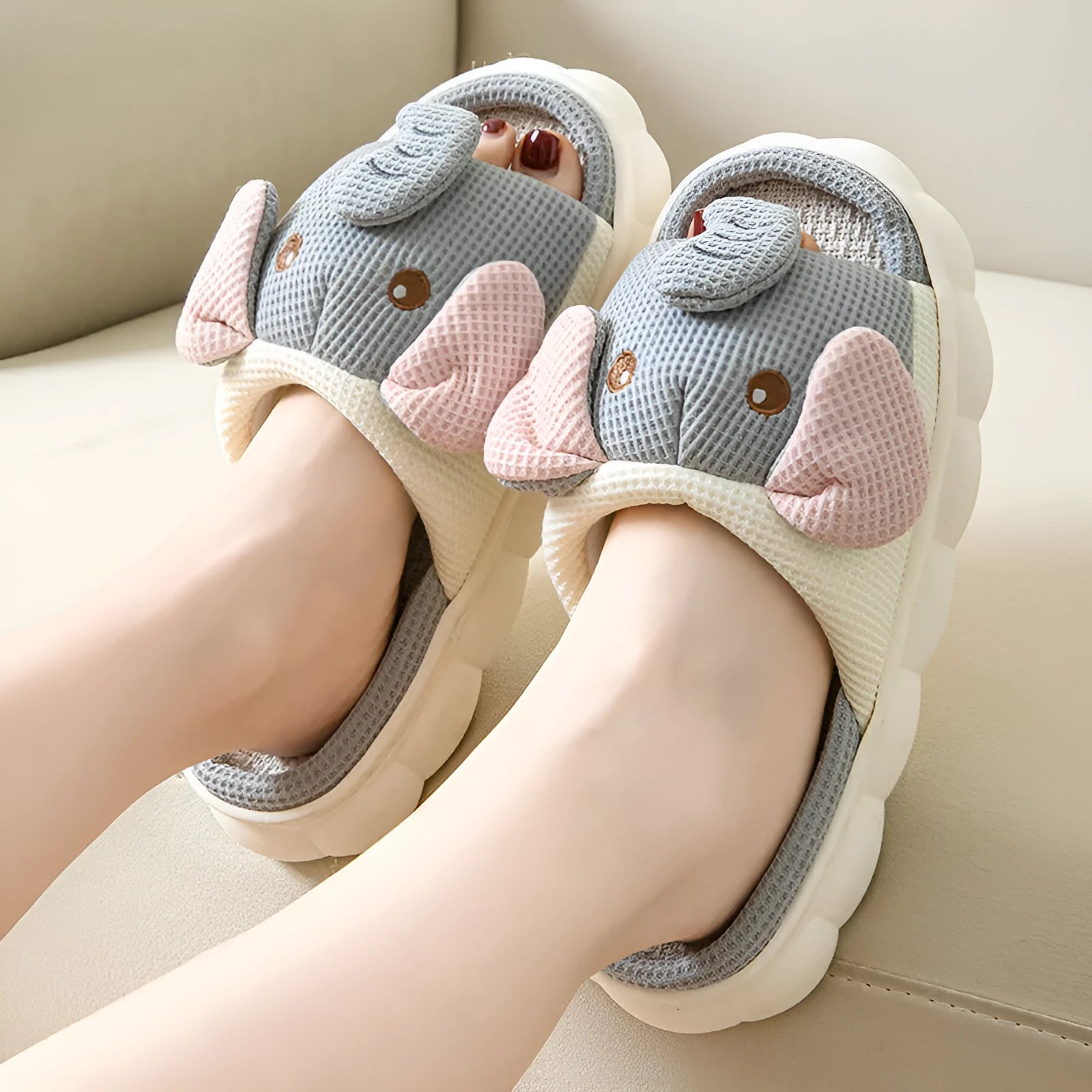 Elephant grey linen open toe slippers for couples with PVC soles on wooden floor