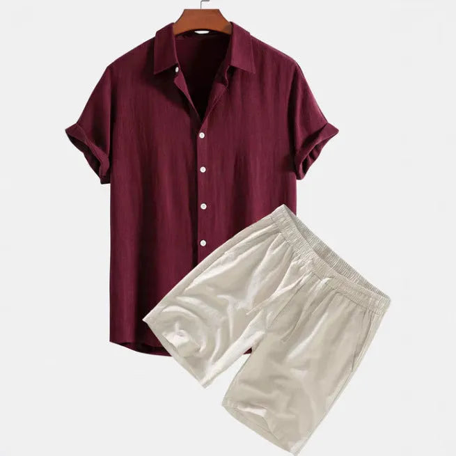Men's solid colour casual short-sleeved shirt and shorts suit set on a hanger.