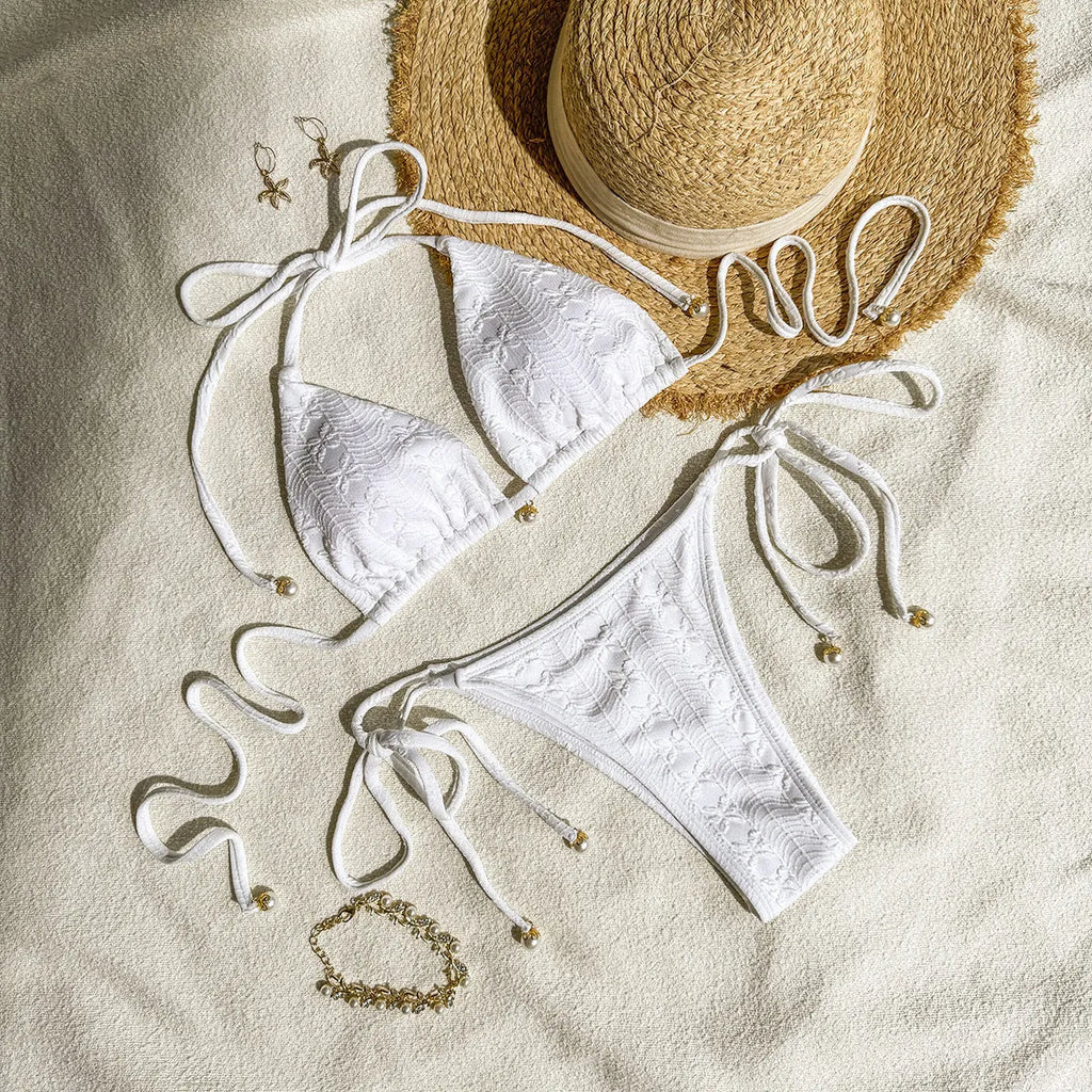 Women's halter neck lace-up bikini swimsuit in polyester fabric available in milky white, green, and white colours