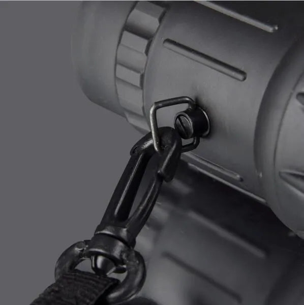 Black 16x52 monocular telescope showing compact 145mm size with 52mm objective lens and eyepiece adjustment