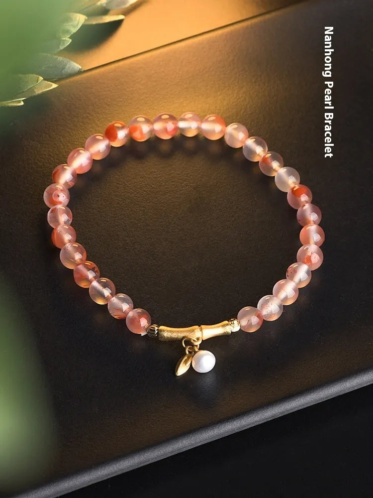 Agate bracelet with flower design and bamboo joint elements featuring Nanhong ice float gemstone