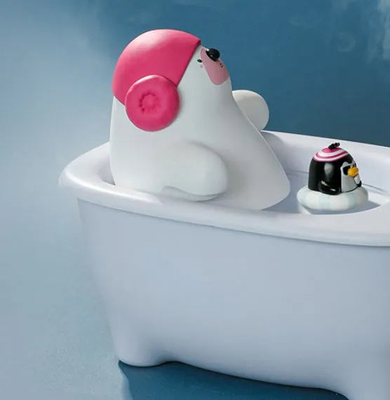 White USB desktop air humidifier with large water tank showing mist output.