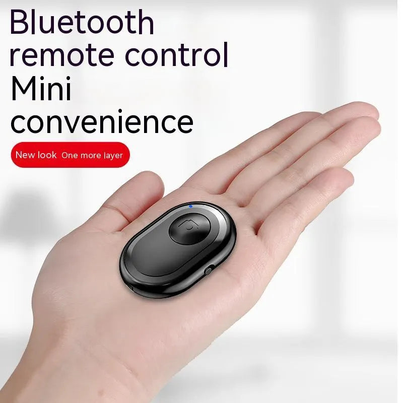 Wireless Bluetooth remote control for smartphone photography in black, pink, and purple colour options