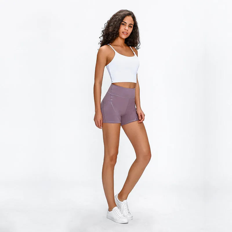 SHINBENE high waisted women's athletic shorts in black with two side pockets, soft cotton blend fabric
