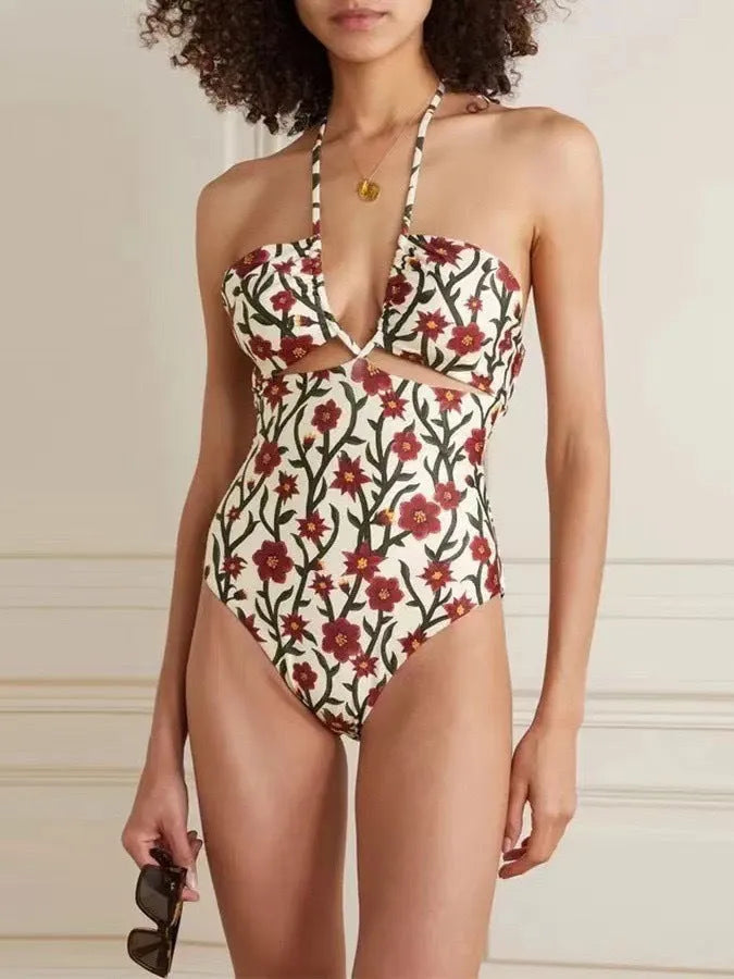 Women's two-piece swimsuit set with halter neck design and floral pattern gauze skirt