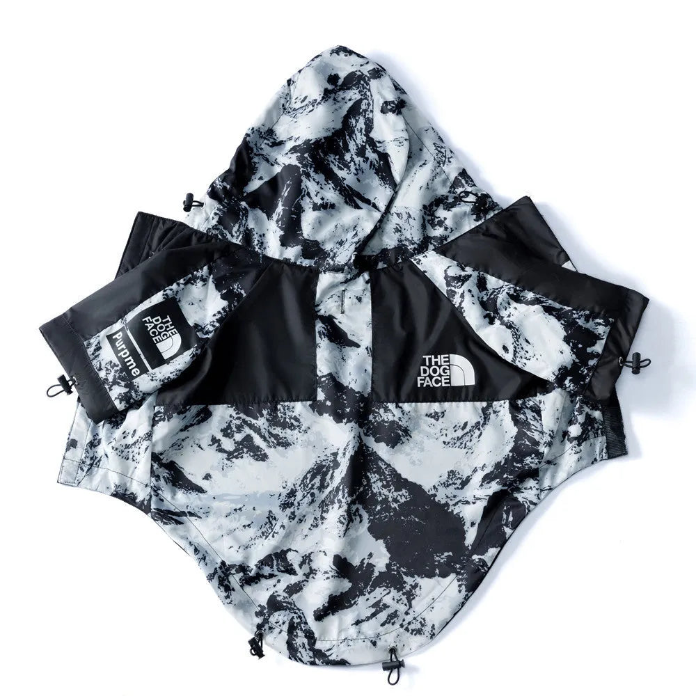 Dog wearing a windproof cotton coat with Five Generation Snow Mountain pattern, polyester material, available in sizes S to 5XL