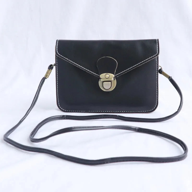 Soft retro cross square flap messenger bag in wine red, shown with lock detail and crossbody strap.