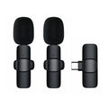 Wireless lavalier noise reduction microphone with clip, receiver, and Type C interface on white background