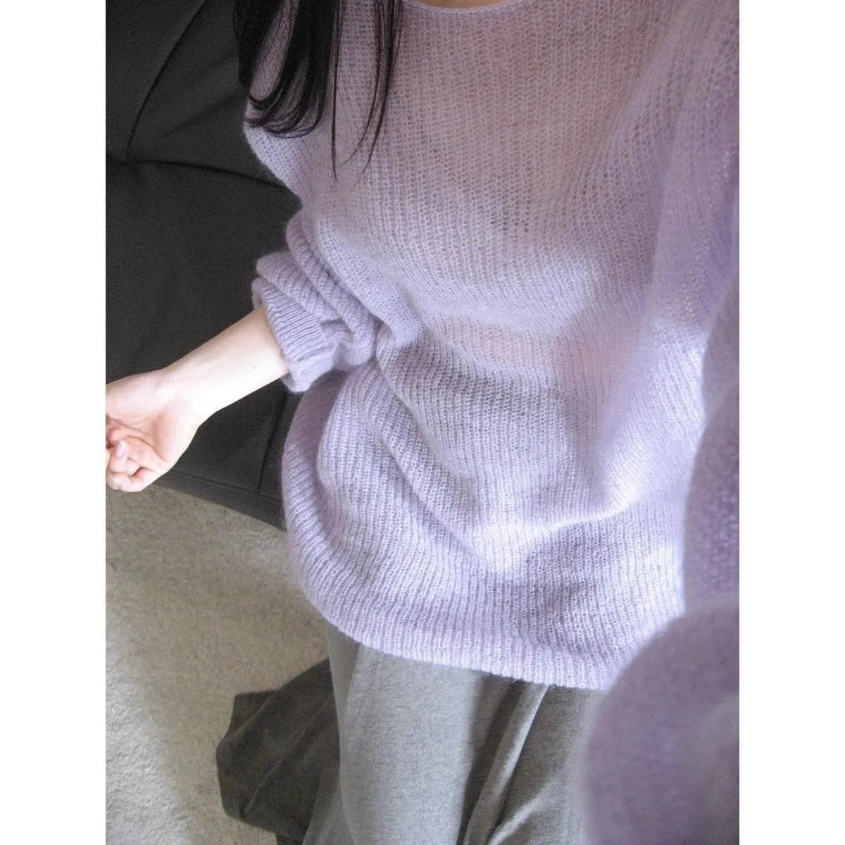 Women's purple round neck lightweight sweater with princess sleeves and hollow out design.