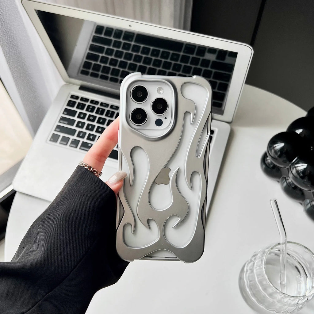 Electroplated hollow flame pattern mobile phone case for iPhone on a dark background, showing silver metallic finish.