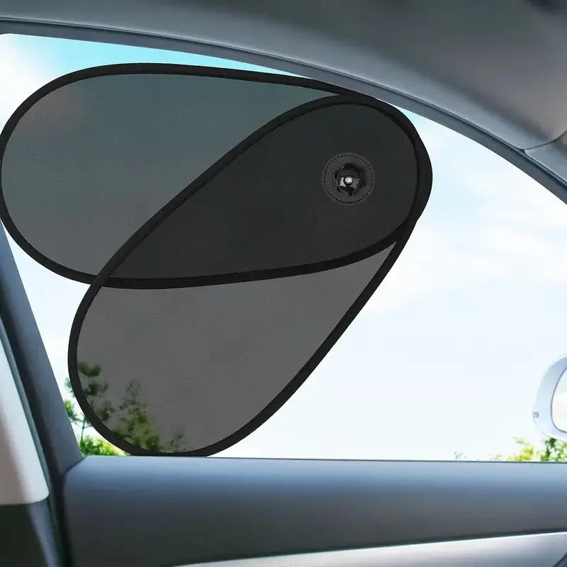 Black stretchy car side window sunshade fitted on a car door, showing suction cups and mesh fabric.