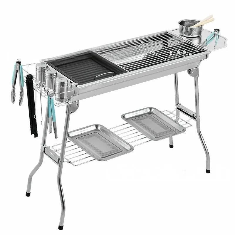 Stainless steel portable folding barbecue oven with cooking grill.