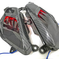 Pair of aftermarket side lamps for Yamaha NMAX motorbike with carbon fibre design and LED light.