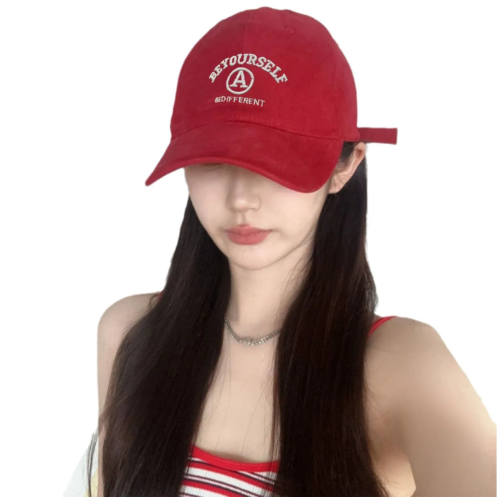 Cotton baseball cap with embroidered couple face, adjustable head circumference, available in six colours