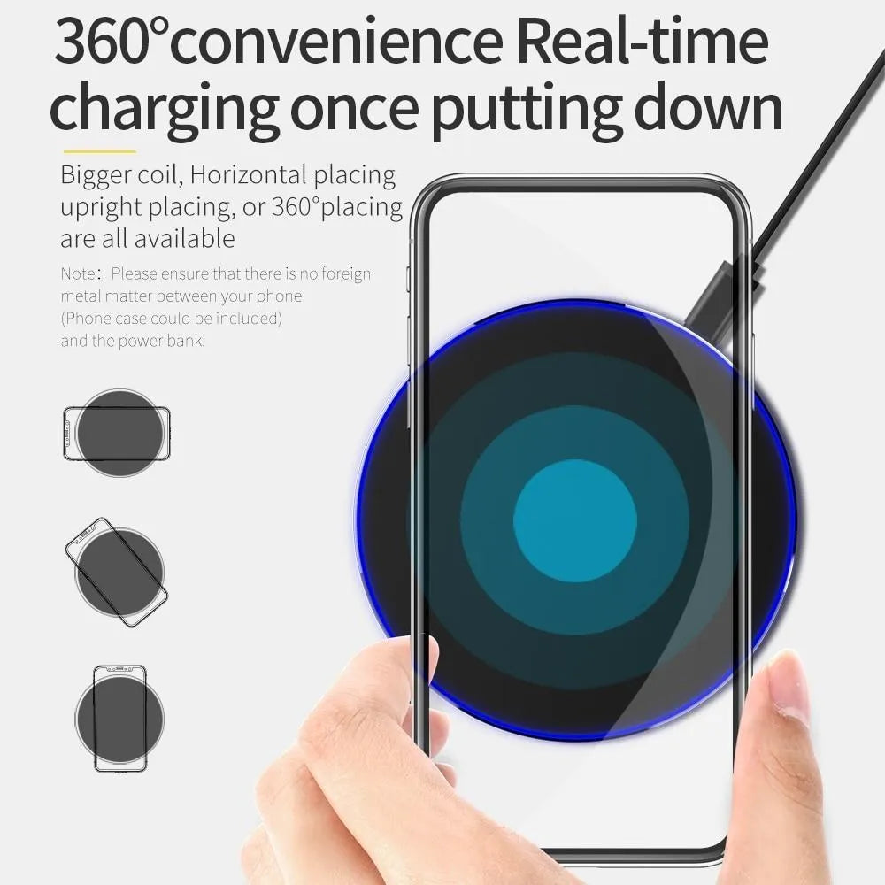 Black square wireless charging pad on desk with smartphone charging wirelessly