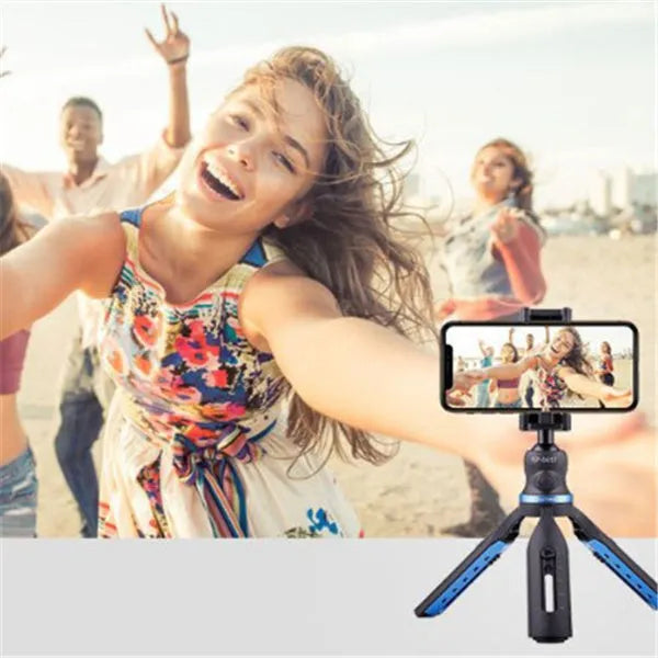 Black desktop mobile phone tripod for Apple iPhone and Huawei P30 models.