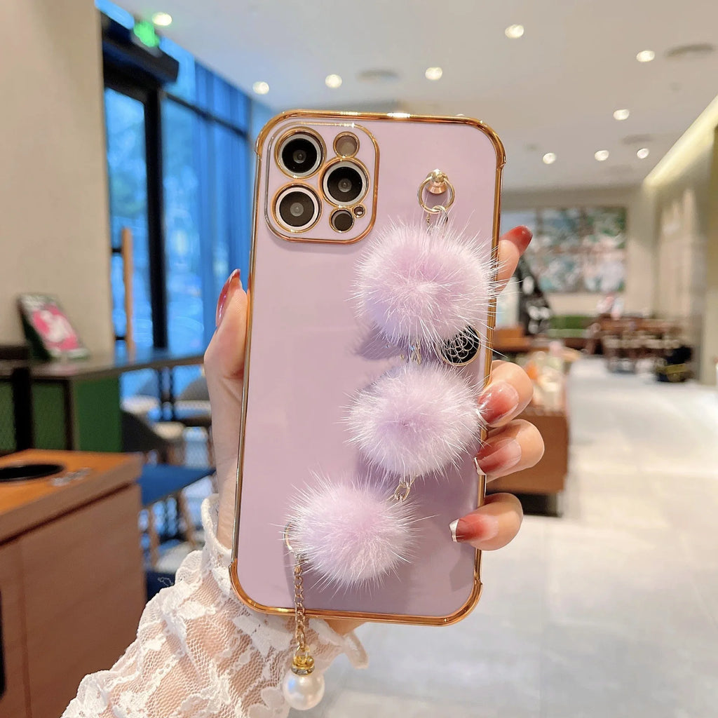 Electroplated TPU phone case with plush bracelet for iPhone, black colour, showing back and side coverage