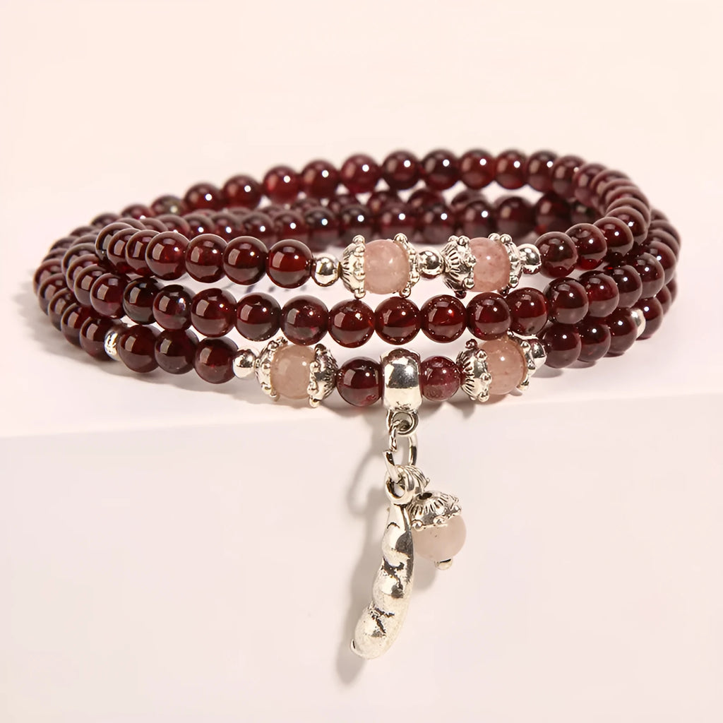 Women's floral crystal bracelet in sauteed green beans and wine red garnet colour with Bohemian and ethnic style.