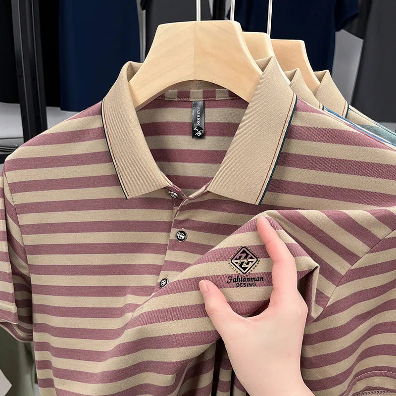 Man wearing a red and white mosaic-knit striped short sleeve t-shirt, showing textured pattern detail.
