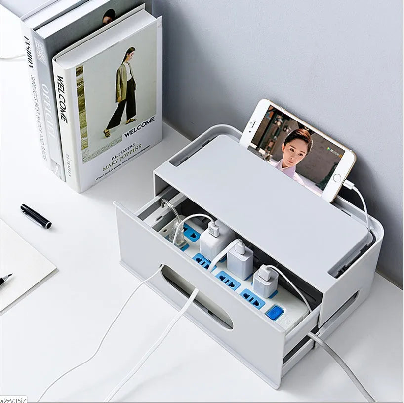 Gray and white plastic wireless router storage box with cable management compartments